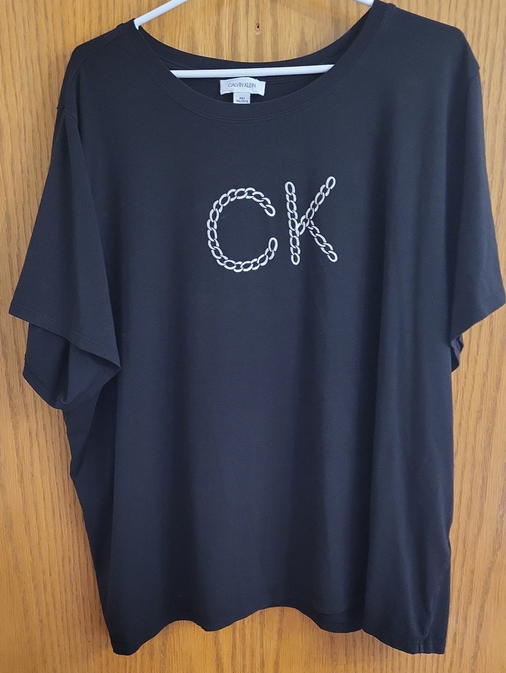 Calvin Klein Black Tee with Chain-Style CK Logo